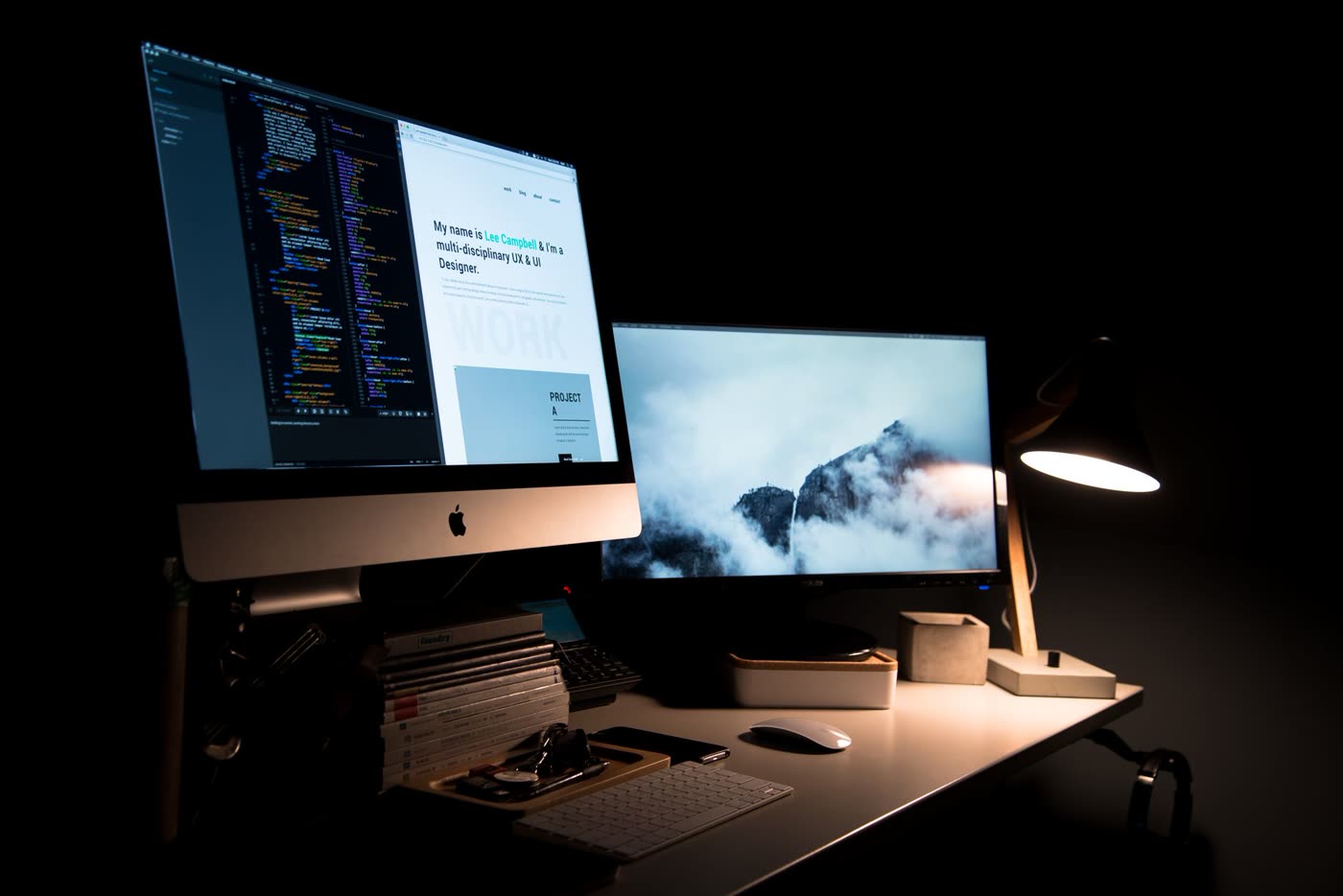 Workspace with design and code on screen